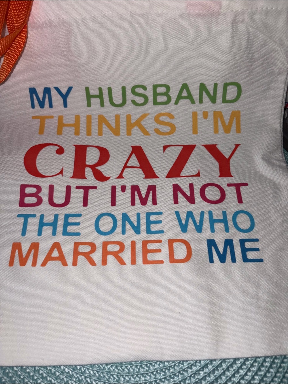 White Tote Bag with Multicolor Text - My Husband Thinks I'm Crazy  14”x13”